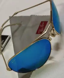 lente azul espejado (blue mirror), marco dorado