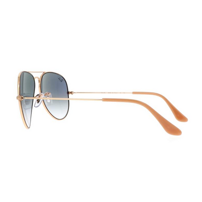 aviador clasico dorado con lentes celestes